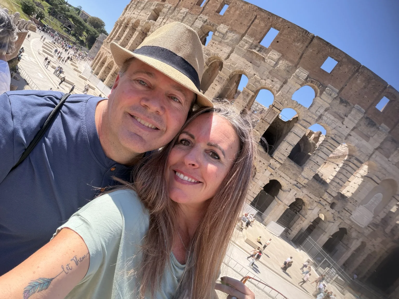Renee and Andy visiting the Colosseum in Rome